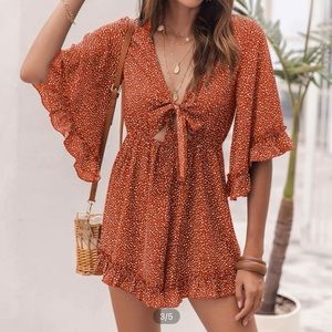 Ruffe trim tie front romper